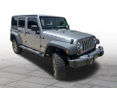Used 2013 Jeep Wrangler Unlimited Sport AWD/4WD image 1