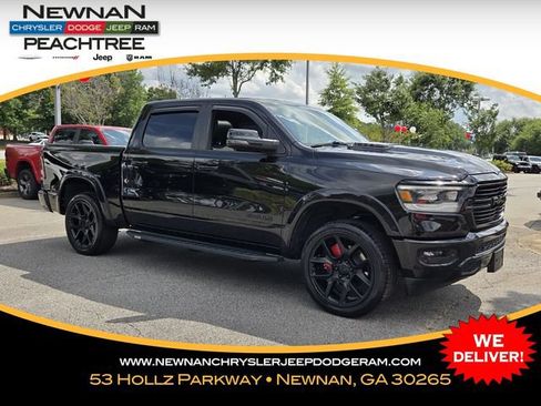 Used 2024 RAM 1500 Laramie AWD/4WD image 1