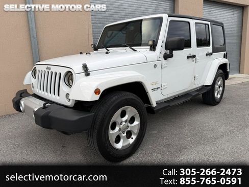 Used 2014 Jeep Wrangler Unlimited Sahara AWD/4WD image 1