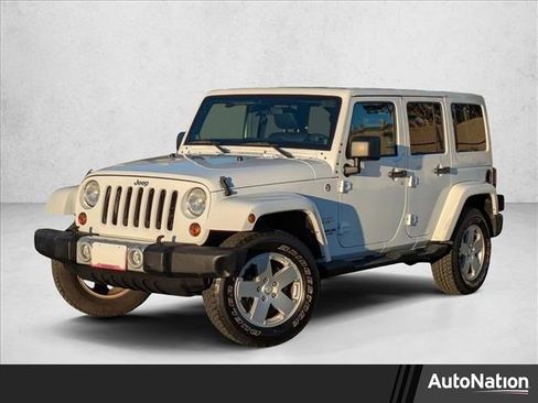 Used 2012 Jeep Wrangler Unlimited Sahara w/ Dual Top Group image 1