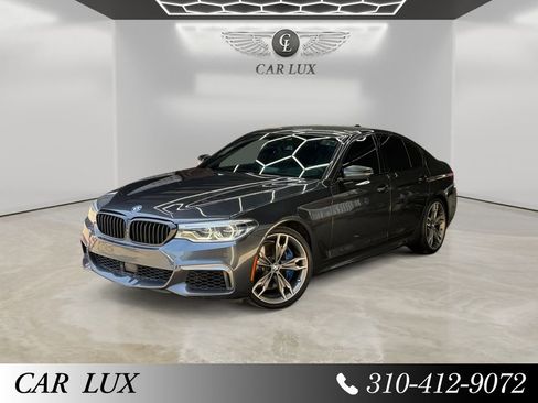 Used 2019 BMW M550i xDrive w/ Dynamic Handling Package AWD/4WD image 1