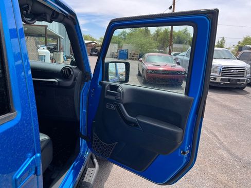 Used 2014 Jeep Wrangler Unlimited Sahara AWD/4WD image 18