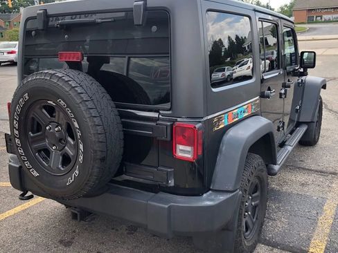 Used 2015 Jeep Wrangler Unlimited Sport w/ Mopar Black Appearance Group image 8