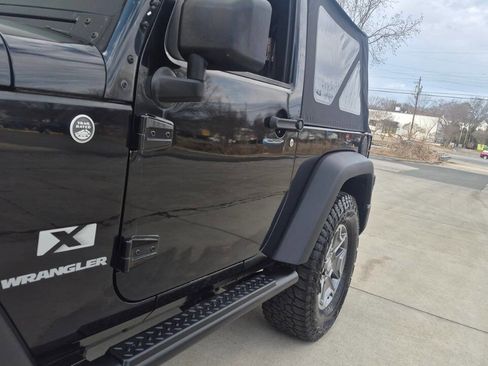 Used 2009 Jeep Wrangler X w/ Black Appearance Group AWD/4WD image 17