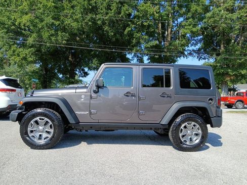 Used 2014 Jeep Wrangler Unlimited Rubicon w/ Connectivity Group AWD/4WD image 1