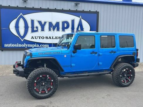 Used 2016 Jeep Wrangler Unlimited Rubicon w/ Dual Top Group AWD/4WD image 1