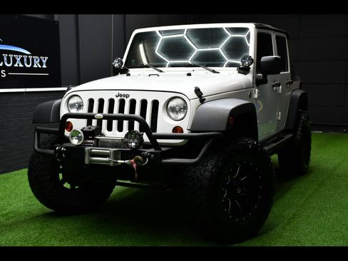 Used 2013 Jeep Wrangler Unlimited Sport w/ Connectivity Group AWD/4WD image 1