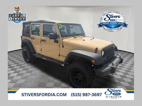 Used 2013 Jeep Wrangler Unlimited Sport w/ Mopar Black Appearance Group AWD/4WD image 1