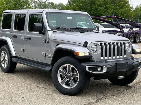 Used 2021 Jeep Wrangler Unlimited Sahara w/ Uconnect 4C Nav & Sound Group AWD/4WD image 1