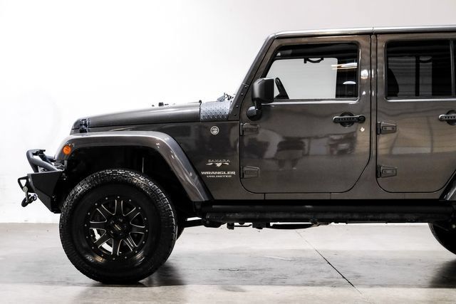 Used 2016 Jeep Wrangler Unlimited Sahara w/ Dual Top Group AWD/4WD image 16