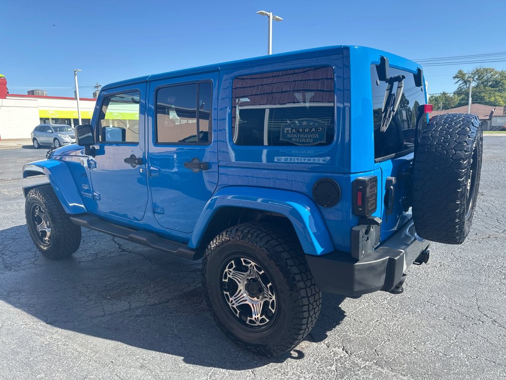 Used 2011 Jeep Wrangler Unlimited Sahara w/ Dual Top Group AWD/4WD image 3