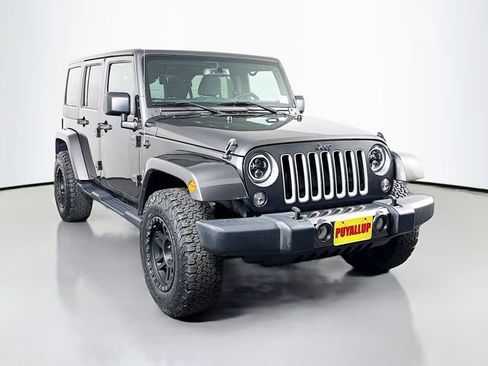 Used 2017 Jeep Wrangler Unlimited Sahara AWD/4WD image 1