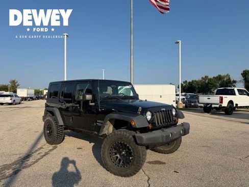 Used 2010 Jeep Wrangler Unlimited Sport AWD/4WD image 1