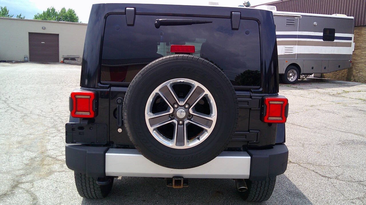 Used 2014 Jeep Wrangler Unlimited Sahara w/ Dual Top Group AWD/4WD image 6