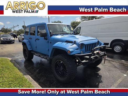 Used 2014 Jeep Wrangler Unlimited Sport AWD/4WD image 1