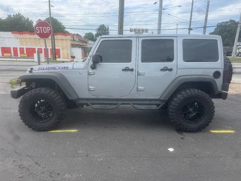 Used 2014 Jeep Wrangler Unlimited Rubicon w/ Dual Top Group AWD/4WD image 3
