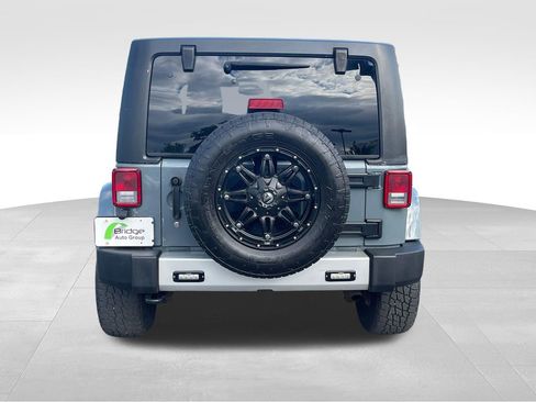 Used 2014 Jeep Wrangler Unlimited Sahara w/ Dual Top Group AWD/4WD image 6
