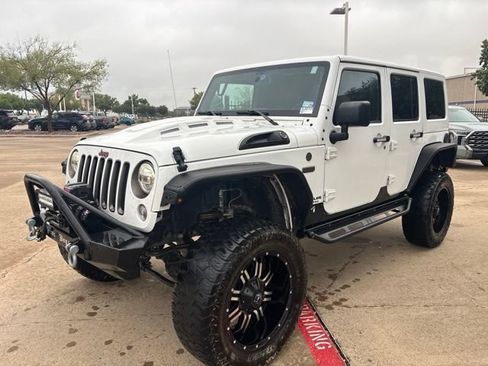 Used 2016 Jeep Wrangler Unlimited Sahara AWD/4WD image 1