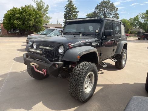Used 2014 Jeep Wrangler Unlimited Sport w/ Connectivity Group AWD/4WD image 1