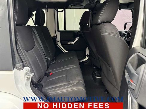 Used 2013 Jeep Wrangler Unlimited Sahara w/ Dual Top Group AWD/4WD image 17