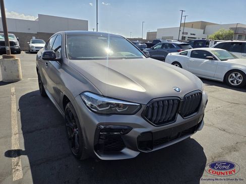 Used 2022 BMW X6 M50i AWD/4WD image 1
