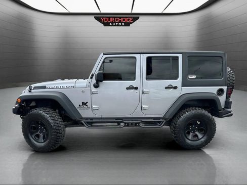 Used 2015 Jeep Wrangler Unlimited Rubicon w/ Dual Top Group AWD/4WD image 9