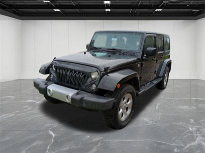 Used 2014 Jeep Wrangler Unlimited Sahara w/ Dual Top Group