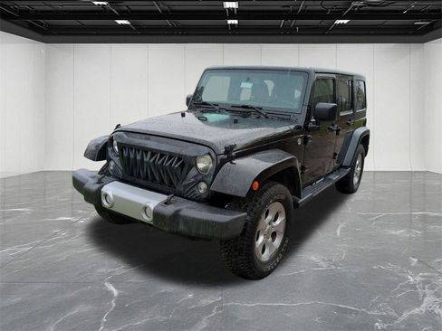 Used 2014 Jeep Wrangler Unlimited Sahara w/ Dual Top Group image 1