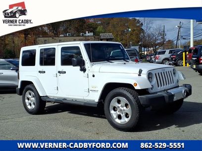 Used 2015 Jeep Wrangler Unlimited Sahara w/ Dual Top Group