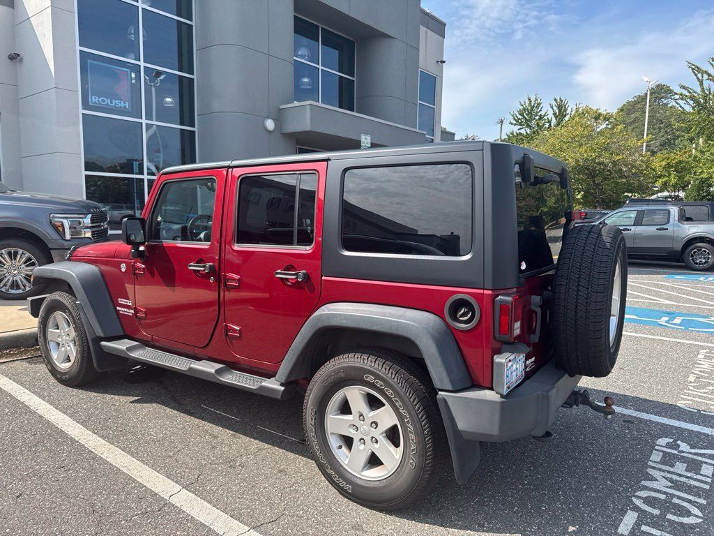 Used 2013 Jeep Wrangler Unlimited Sport AWD/4WD image 8