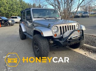 Used 2013 Jeep Wrangler Unlimited Sahara w/ Dual Top Group video 1