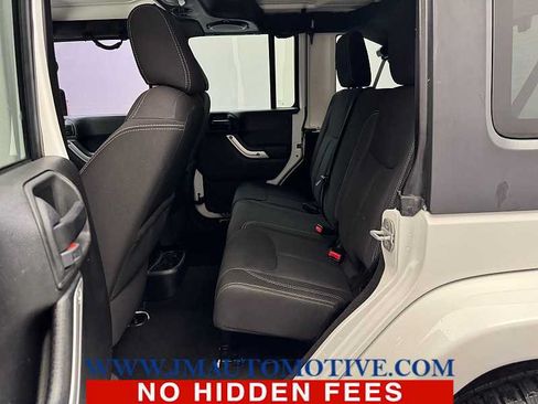Used 2013 Jeep Wrangler Unlimited Sahara w/ Dual Top Group AWD/4WD image 14