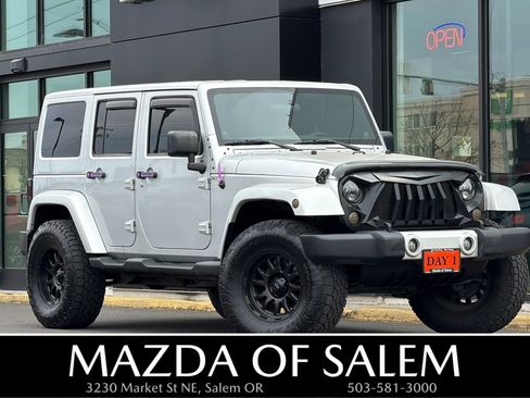 Used 2012 Jeep Wrangler Unlimited Sahara w/ Connectivity Group AWD/4WD image 1