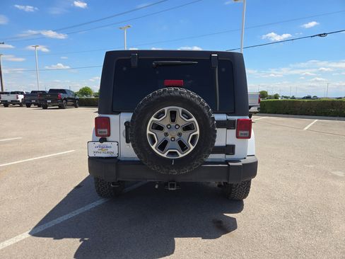 Used 2013 Jeep Wrangler Unlimited Sahara w/ Trailer Tow Group AWD/4WD image 3