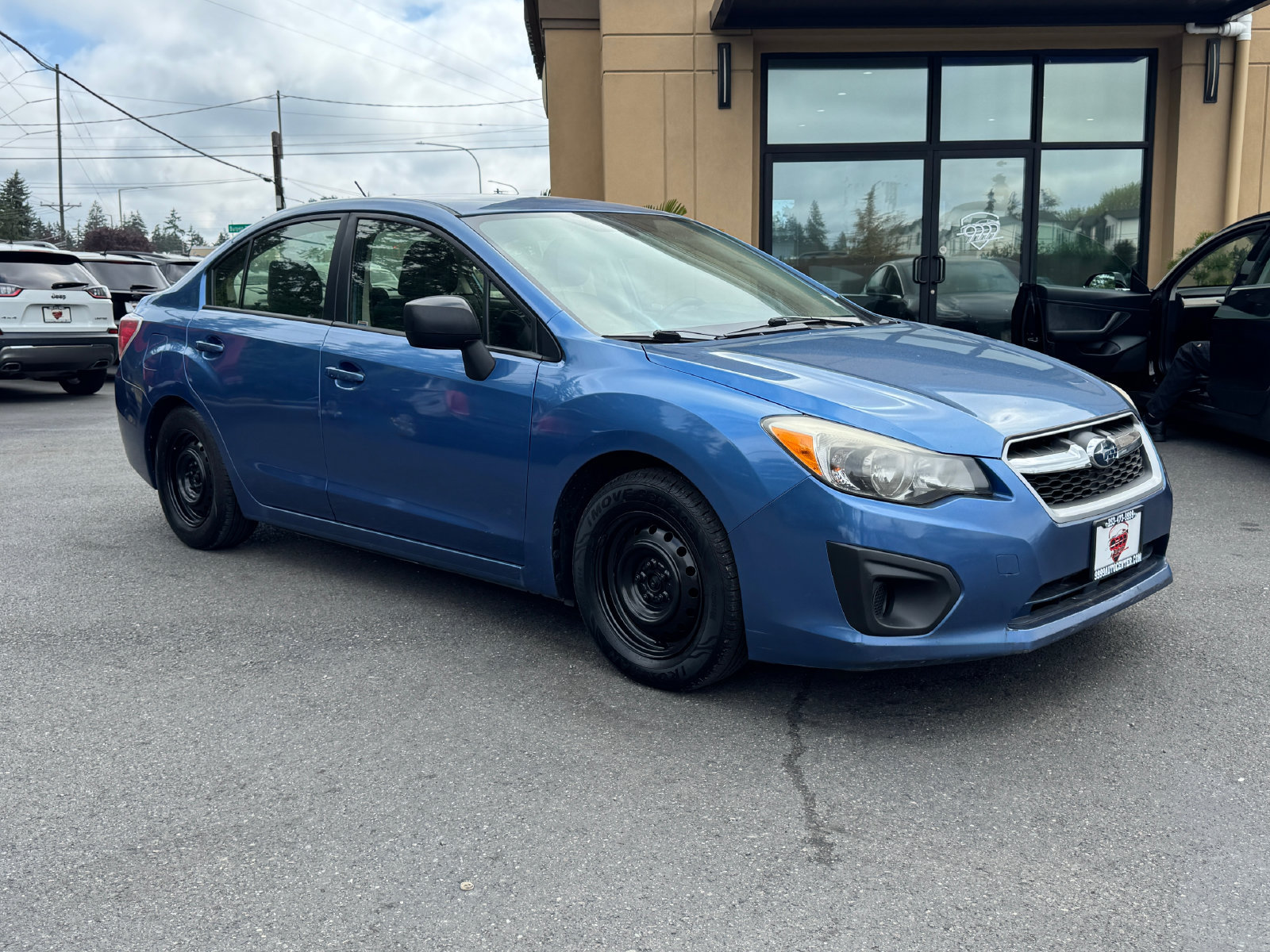 Used 2014 Subaru Impreza 2.0i AWD/4WD image 1