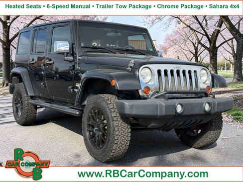 Used 2011 Jeep Wrangler Unlimited Sahara w/ Mopar Chrome Edition Group AWD/4WD image 1