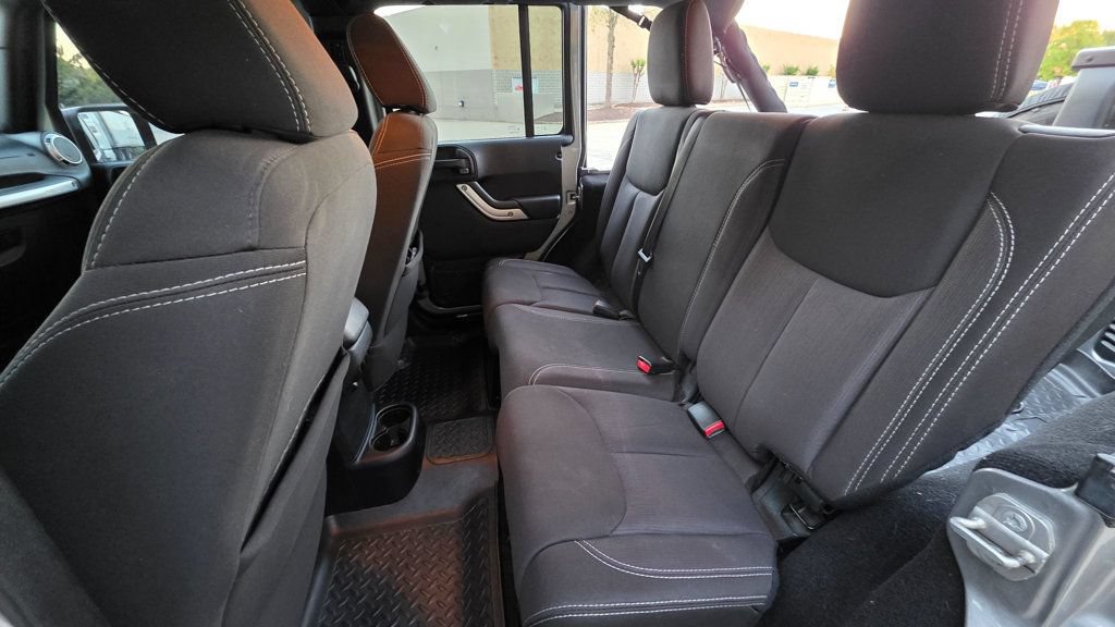 Used 2014 Jeep Wrangler Unlimited Sahara AWD/4WD image 32