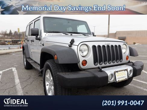 Used 2011 Jeep Wrangler Unlimited Sport AWD/4WD image 1