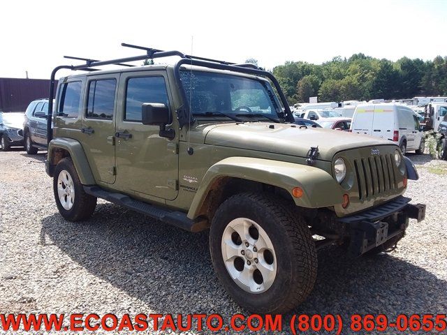 Used 2013 Jeep Wrangler Unlimited Sahara w/ Dual Top Group AWD/4WD image 1