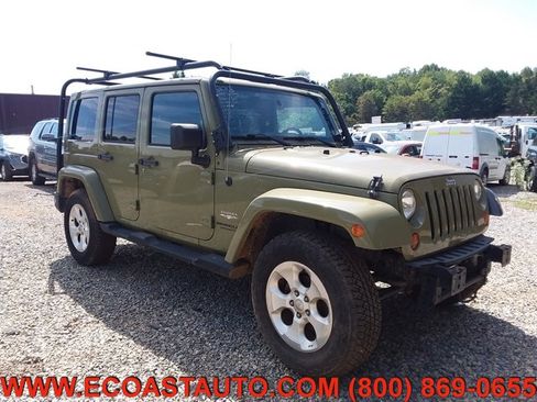 Used 2013 Jeep Wrangler Unlimited Sahara w/ Dual Top Group image 1