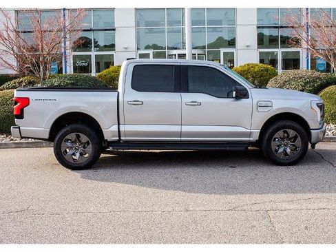 Certified 2023 Ford F150 Lightning XLT w/ Equipment Group 312A High image 1