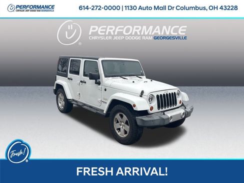 Used 2012 Jeep Wrangler Unlimited Sahara w/ Dual Top Group image 1