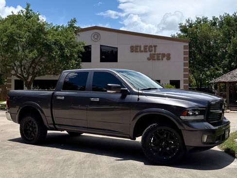 Used 2015 RAM 1500 Laramie w/ Convenience Group AWD/4WD image 1