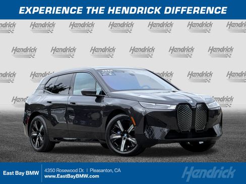 Used 2024 BMW iX xDrive50 w/ Premium Package AWD/4WD image 1