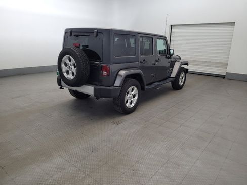Used 2014 Jeep Wrangler Unlimited Sahara w/ Dual Top Group AWD/4WD image 9