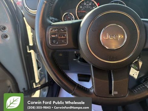 Used 2014 Jeep Wrangler Unlimited Sahara w/ Dual Top Group AWD/4WD image 16