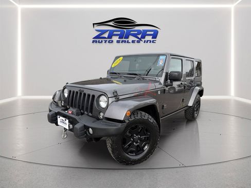 Used 2016 Jeep Wrangler Unlimited Sahara AWD/4WD image 1