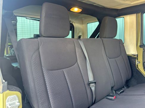 Used 2013 Jeep Wrangler Unlimited Sport w/ Mopar Black Appearance Group image 30