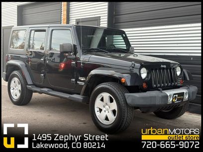 Used 2011 Jeep Wrangler Unlimited Sahara w/ Dual Top Group