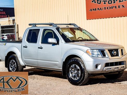 Used 2020 Nissan Frontier PRO-4X w/ Pro-4x Utility Package image 1